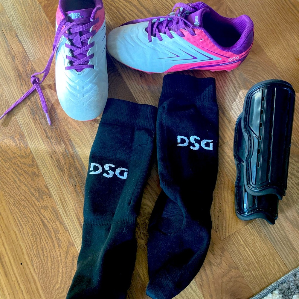 Girls size 1 soccer cleats with shin guards slip in